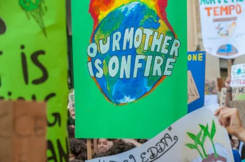 Fridays for future: students hands showing  banners and boards Stock Photos