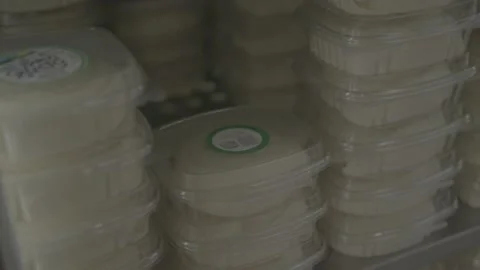 Fridge with many packed and sorted cheeses Stock Footage 222014880
