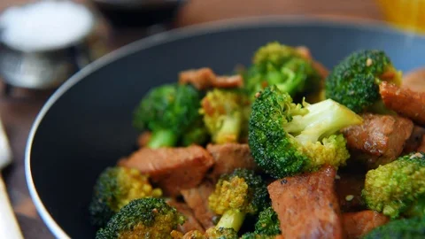 Friead broccoli and beef in pan Stock Footage 70455122