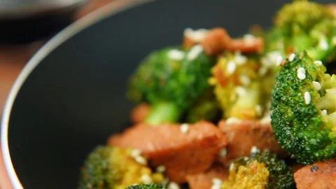 Friead broccoli and beef in pan Stock Footage 70457558