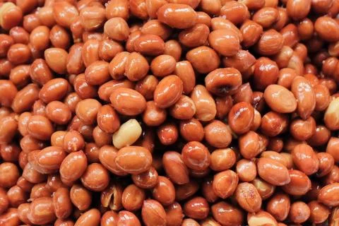 Fried and Salted Peanuts or Groundnut Background Foto stock