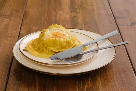 Fried apple pancakes on a plate Stock Photos