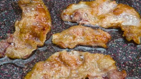 Fried Bacon Slices 4K Stock Footage 227897324