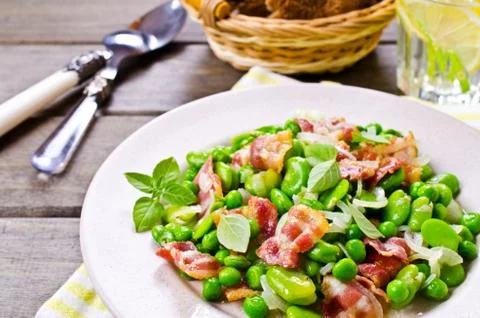 Fried bacon with vegetables Foto stock
