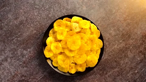 Fried banana chips snack Stock Footage 152906386