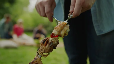 Fried Barbeque Chicken Taking Down from Skewer Stock Footage 144797763