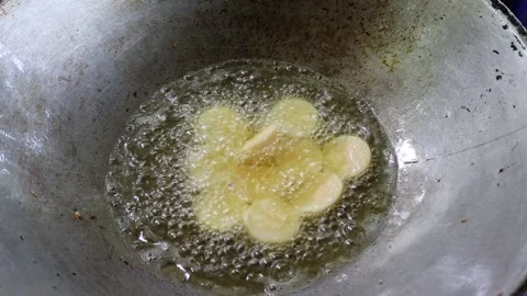 Fried bean curd in metal pan and hot oil Stock Footage 141306273