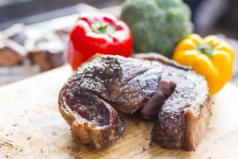Fried beef on the cutting board with chili Stock Photos