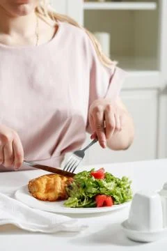 Fried beef with salad on white table. Stock image Stock Photos