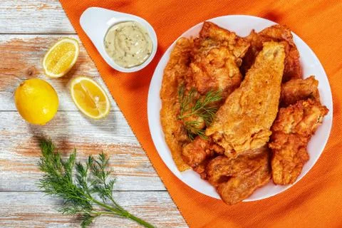 Fried Beer Battered sea fish fillets Stock Photos