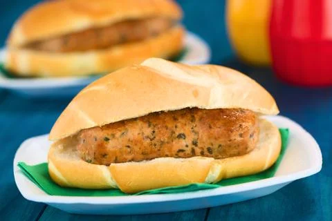 Fried bratwurst in bun Stock Photos