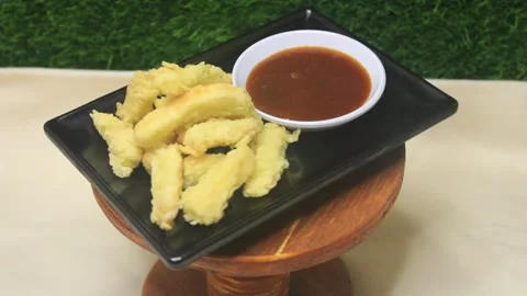 Fried bread dish with dipping sauce Video stock 334268522
