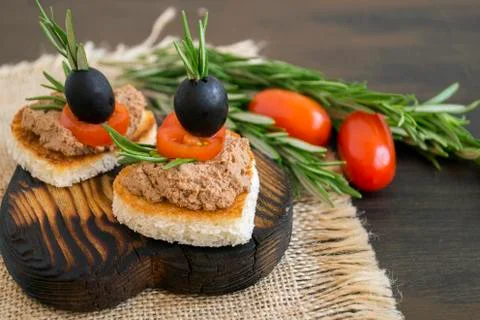 Fried bread with meat pate in the shape of a heart. Stock Photos