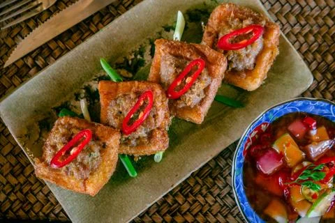 Fried bread with minced pork spread. Thai food Fotos Stock
