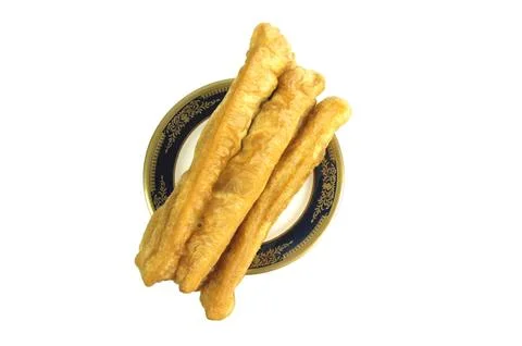 Fried bread or cakwe isolated on a white background. Also known as Youtiao .. Foto stock