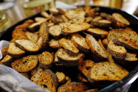 Fried bread with poppy Stock Photos