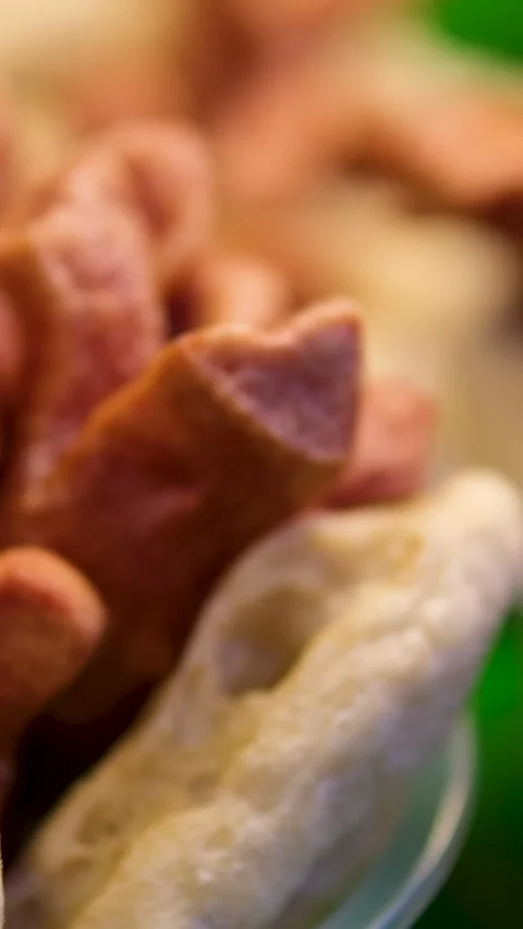 Fried bread snack golden samosas sizzling in a wok, a popular savory snack being Stock Footage 323799441