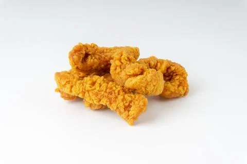 Fried breaded chicken fillet isolated on white background  Stock Photos