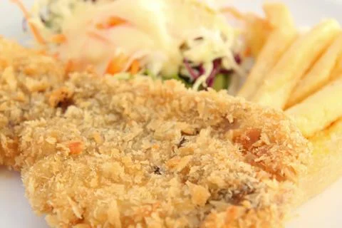 Fried breaded fish steak Stock Photos