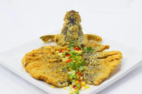 Fried breaded snake head fish Stock Photos
