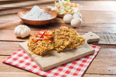 Fried breaded vegetables on the cutting board  in restaurant Stock Photos