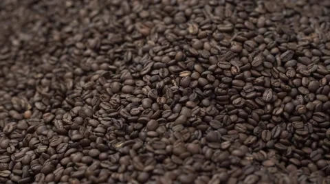 The fried Brown Grains of the Panorama Coffee with Slider Video stock 60215263