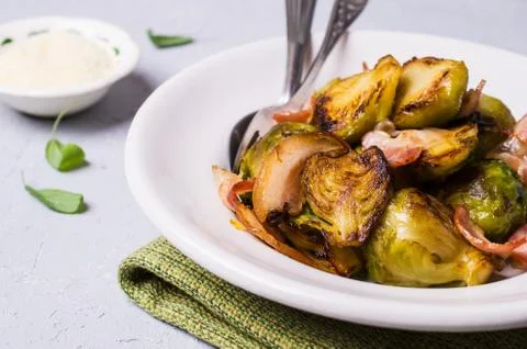Fried Brussels sprouts with bacon Stock Photos