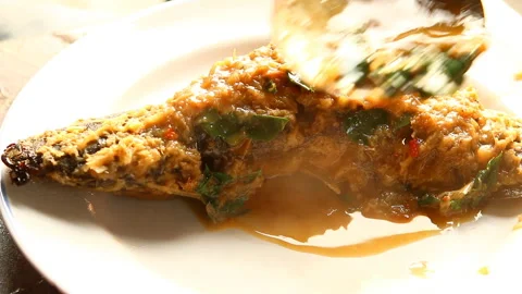  Fried   cat fish  with chili paste  in plate , in door  Chiangmai  Thailand Stock Footage 150987067