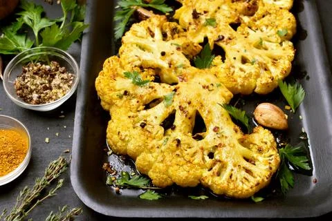 Fried cauliflower steaks Stock Photos