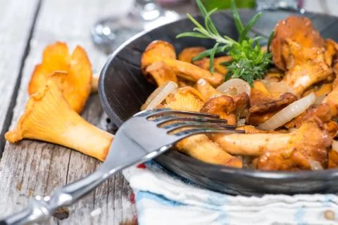 Fried chanterelles Stock Photos