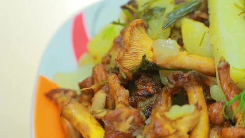 Fried chanterelles with potatoes. Stock Footage 94134119
