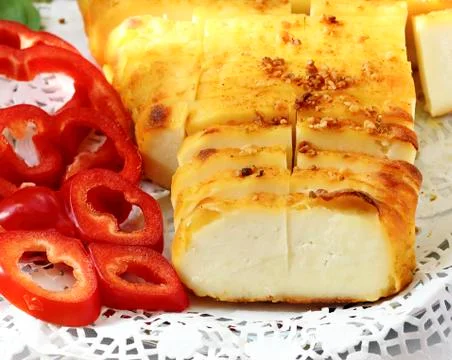 Fried cheese with spices Stock Photos