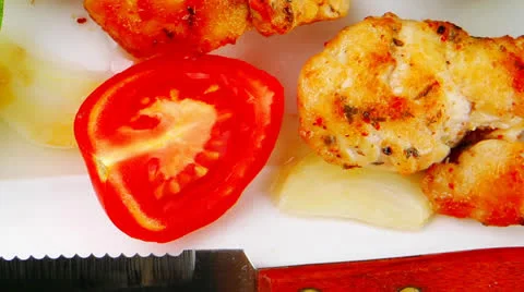 Fried chick on long white plate Stock Footage 26666952