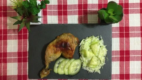 Fried Chicken And Cabbage Cucumber Salad On The Table Stock Footage 100638981