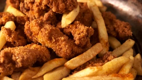 Fried Chicken and Patatoes Table Stock Footage 296319953