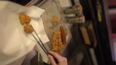 Fried chicken balls are cooked in the fryer and ready to serve Video stock 196190315