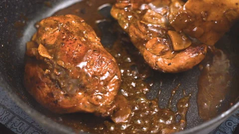 Fried chicken breasts with ginger and chili sauce in a saucepan video Video stock 85757693