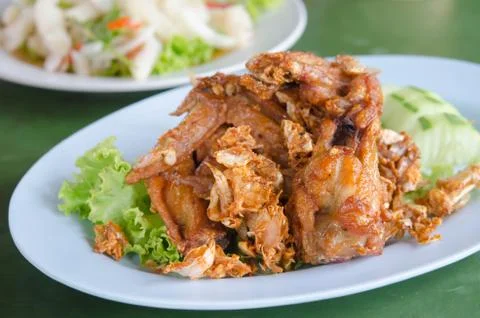 Fried chicken on dish Stock Photos