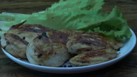Fried chicken fillets on a plate Video stock 82456272