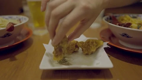 Fried chicken kaagarage dipped in seasoning Stock Footage 233307553