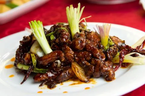 Fried chicken meat with dry chili Stock Photos