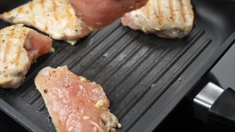 Fried Chicken meat fried in grill pan Close view Video stock 286073222