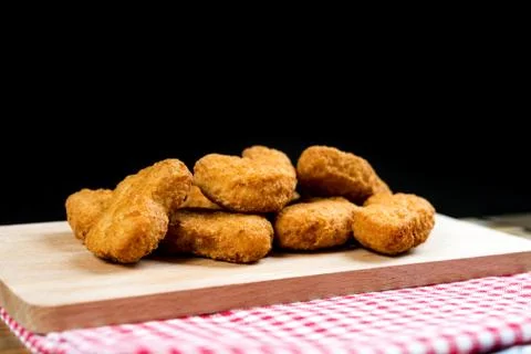 Fried chicken nuggets on table Stock Photos