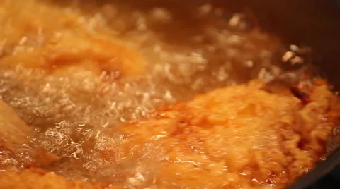 Fried Chicken in Oil Stock Footage