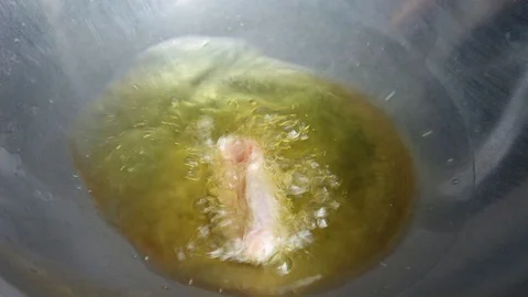 Fried chicken in a pan. Stock Footage 88069675