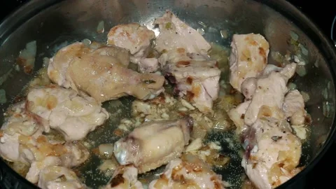Fried chicken in pan Stock Footage 130618985