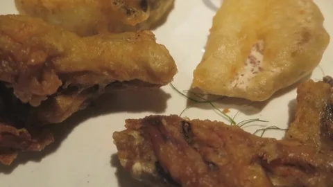 Fried chicken on a plate Stock Footage 70544223