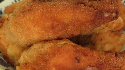 Fried chicken on a plate Stock Footage 75343236