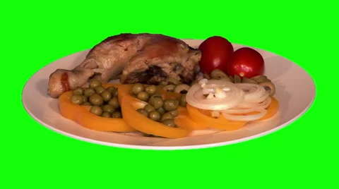Fried chicken with raw vegetables on plate Stock Footage 47541788