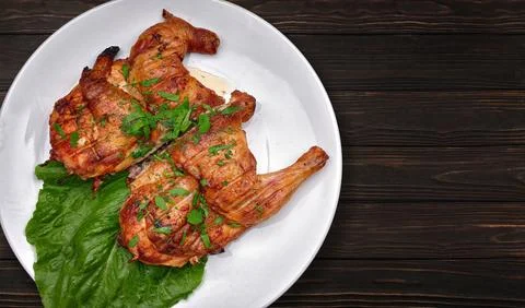 Fried Chicken Tabaka With Herbs Stock Photos